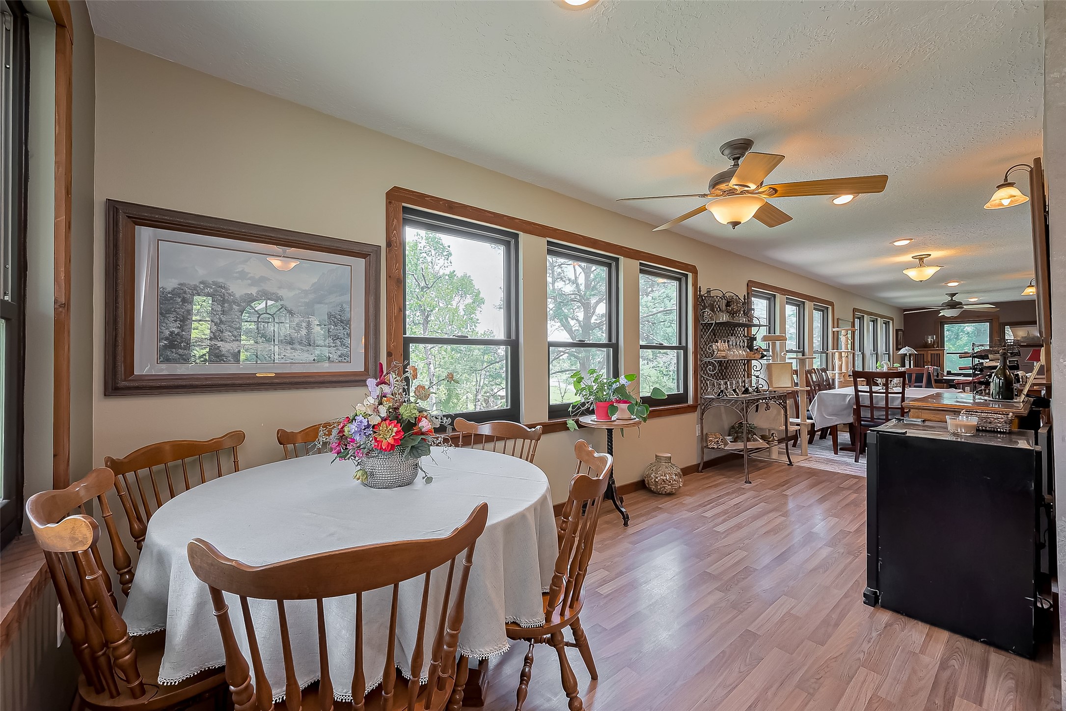 780 Hickory Ridge Drive Coldspring, TX 77331 - Photo 7 of 50 a view of a dining room with furniture large window and wooden floor