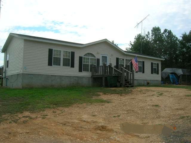 a front view of house with yard