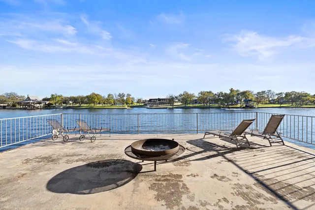 a view of a swimming pool with lounge chair
