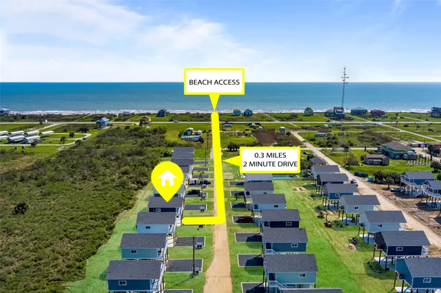 an aerial view of a swimming pool patio and outdoor seating