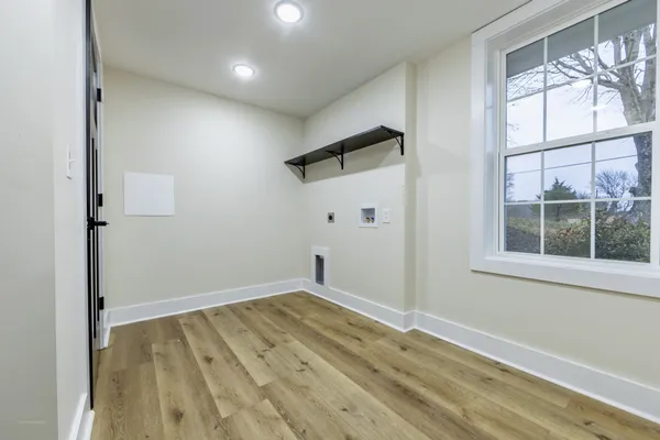 an empty room with windows