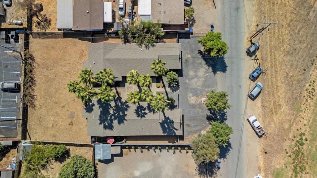 818 A Street Ramona, CA 92065 - Photo 30 of 36 Parking in front of units, and additional parking along the street - open land across street
