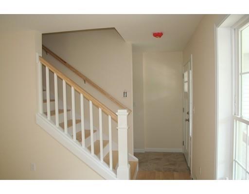 230 Maple Street Winchendon, MA 01475 - Photo 13 of 21 a view of staircase with railing and white walls