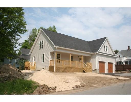 230 Maple Street Winchendon, MA 01475 - Photo 2 of 21 a view of a yard in front of a house with large windows