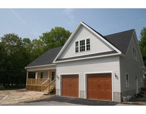 230 Maple Street Winchendon, MA 01475 - Photo 3 of 21 a front view of a house with a yard and garage