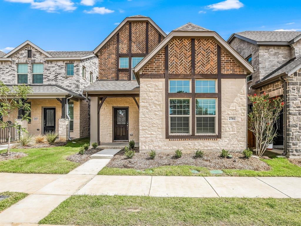 2701 Acadia Drive Corinth, TX 76210 - Photo 1 of 1 a front view of a house with garden