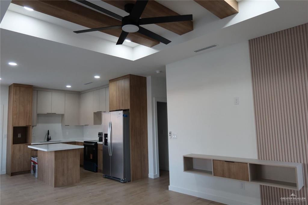 2905 Estevan Street, Unit 2 Mission, TX 78574 - Photo 11 of 11 a kitchen with a refrigerator and a sink