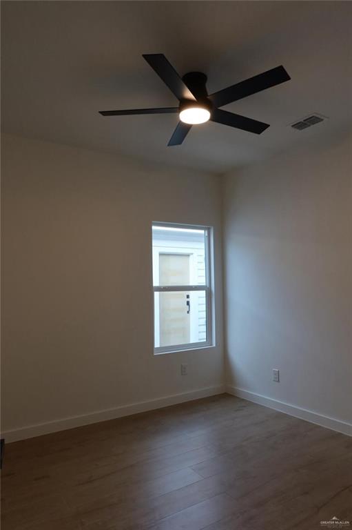 2905 Estevan Street, Unit 2 Mission, TX 78574 - Photo 10 of 11 a view of an empty room with a window