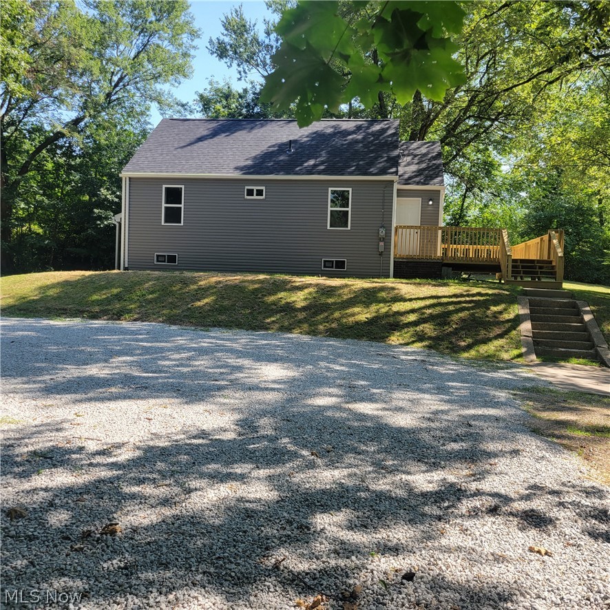 1500 Warner Road Southeast Canton, OH 44707 - Photo 1 of 21 View of side of property with a deck