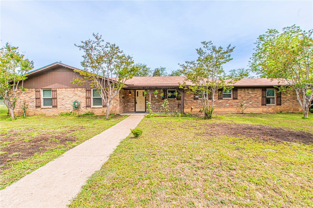 209 Gail Drive Waco, TX 76708 - Photo 1 of 1 a front view of a house with swimming pool
