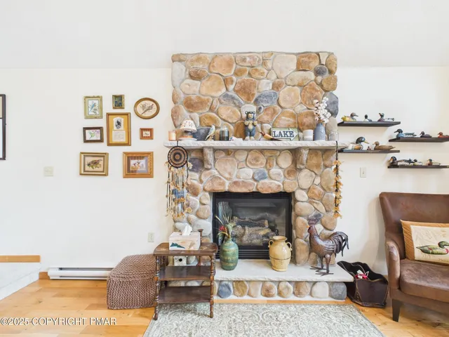a dining room with furniture and a chandelier