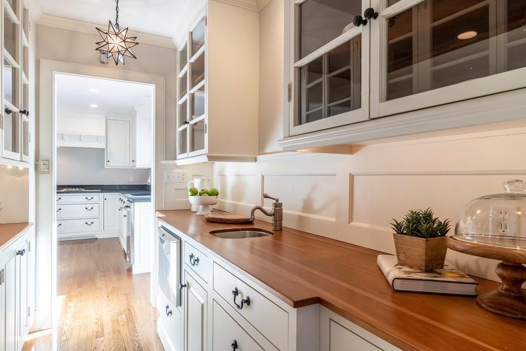 43 Burditt Avenue Hingham, MA 02043 - Photo 1 of 41 a kitchen with a sink and cabinets
