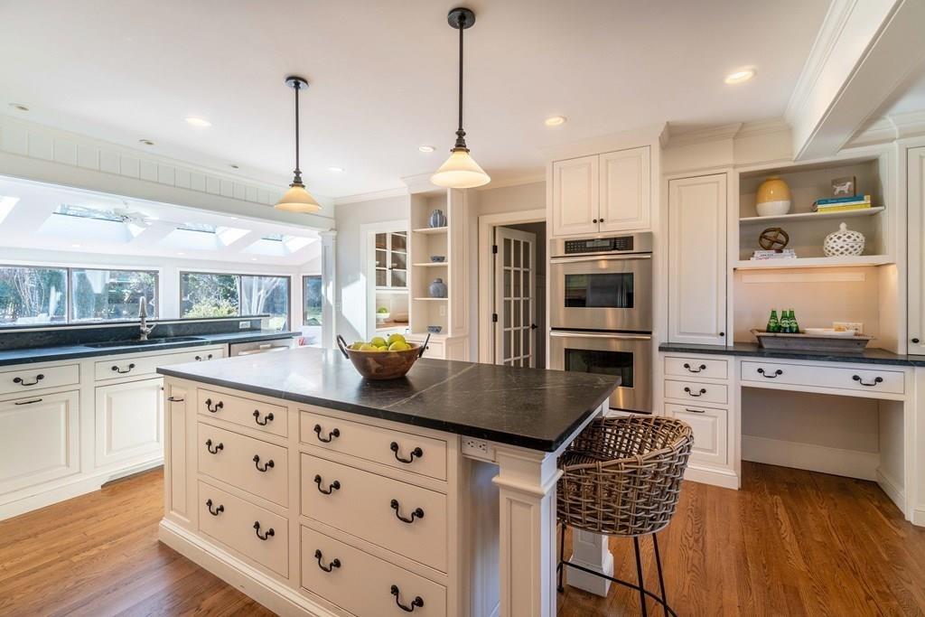 43 Burditt Avenue Hingham, MA 02043 - Photo 13 of 41 a kitchen with stainless steel appliances granite countertop a sink stove and refrigerator