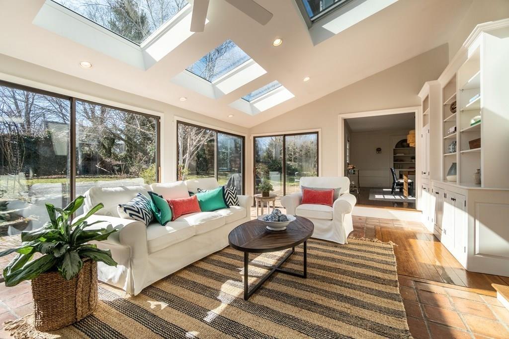 43 Burditt Avenue Hingham, MA 02043 - Photo 17 of 41 a living room with furniture and a potted plant