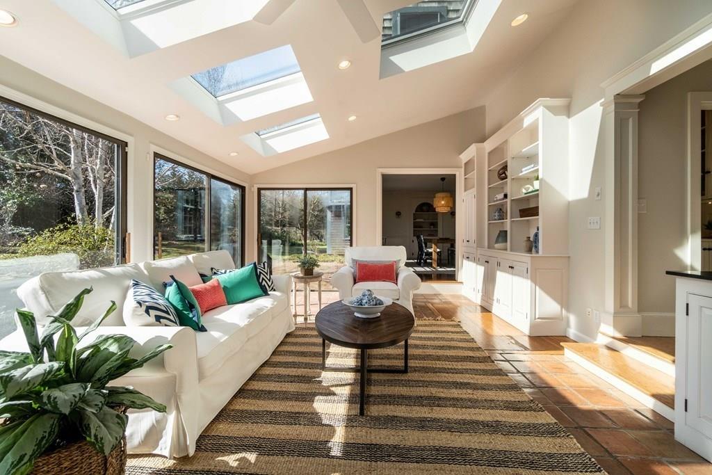 43 Burditt Avenue Hingham, MA 02043 - Photo 18 of 41 a living room with furniture and a large window