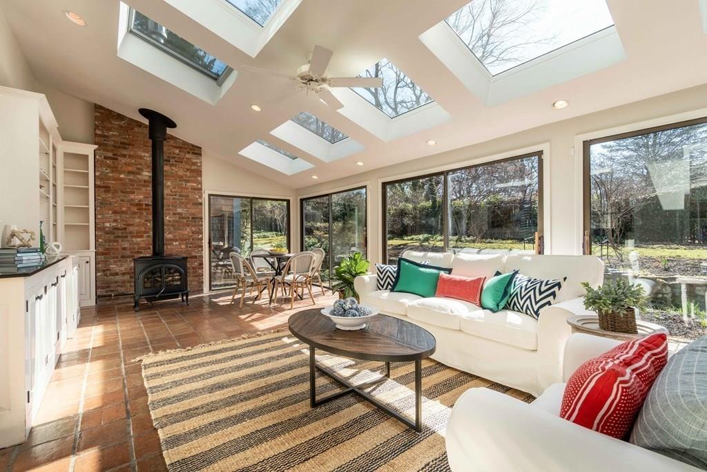 43 Burditt Avenue Hingham, MA 02043 - Photo 19 of 41 a living room with furniture large window and a table