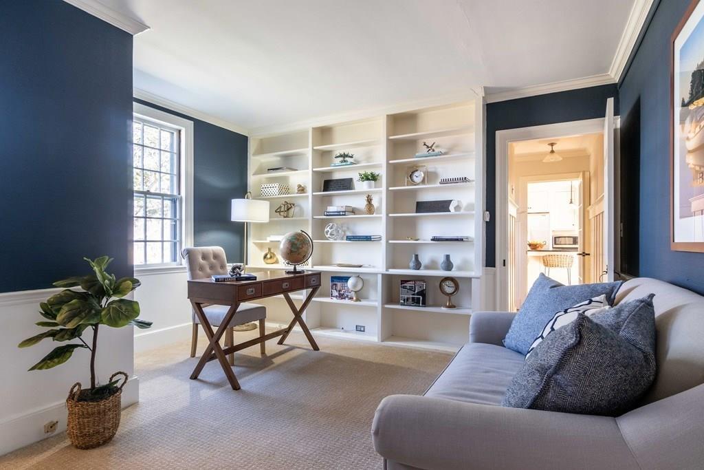 43 Burditt Avenue Hingham, MA 02043 - Photo 20 of 41 a living room with furniture and a potted plant