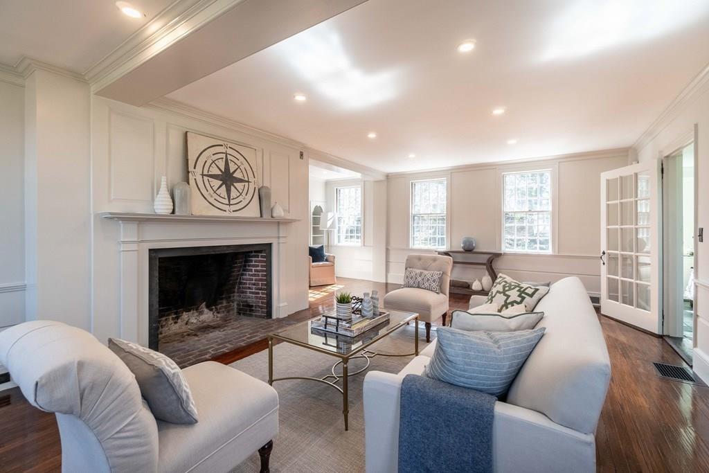 43 Burditt Avenue Hingham, MA 02043 - Photo 25 of 41 a living room with furniture and a fireplace
