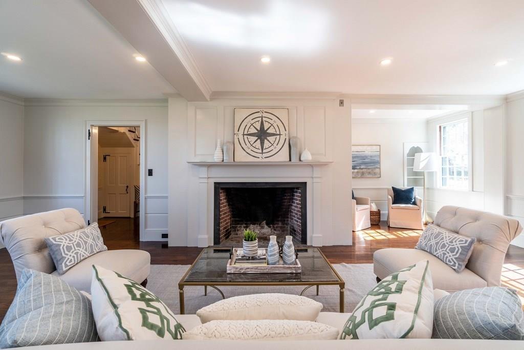 43 Burditt Avenue Hingham, MA 02043 - Photo 26 of 41 a living room with furniture and a fireplace