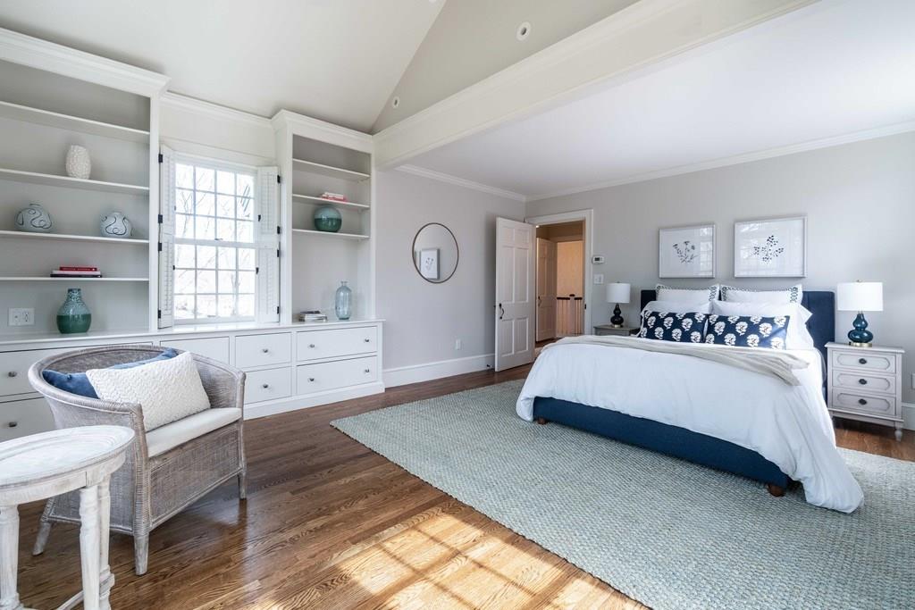 43 Burditt Avenue Hingham, MA 02043 - Photo 30 of 41 a bedroom with a bed and wooden floor