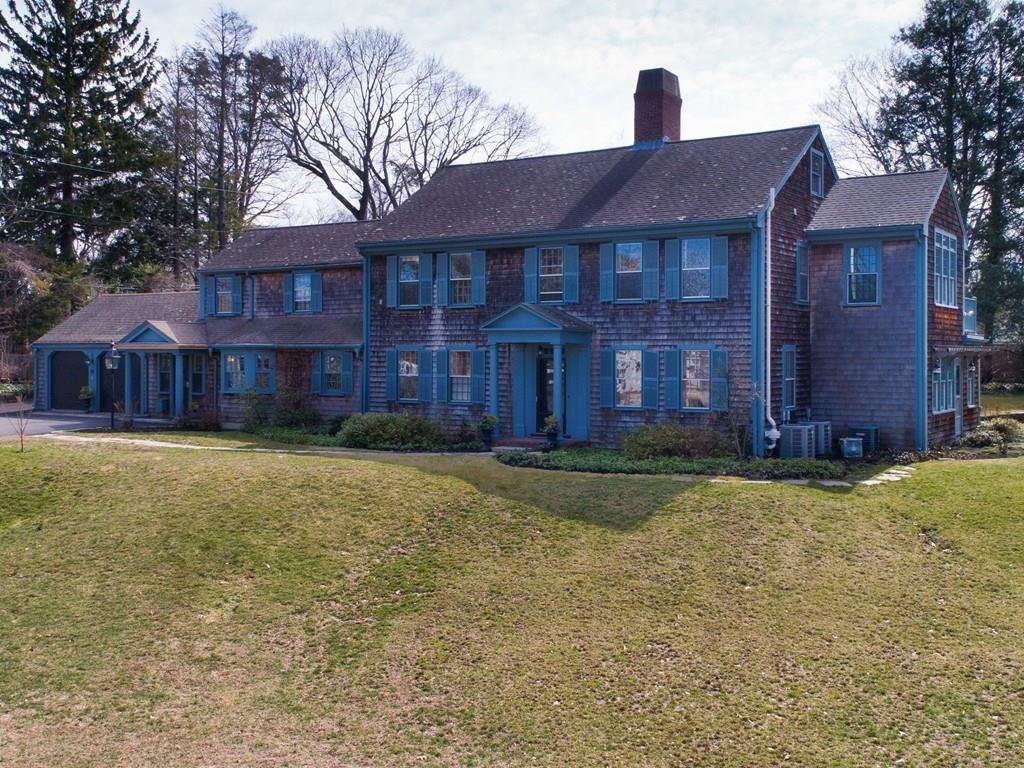 43 Burditt Avenue Hingham, MA 02043 - Photo 3 of 41 a front view of a house with a yard