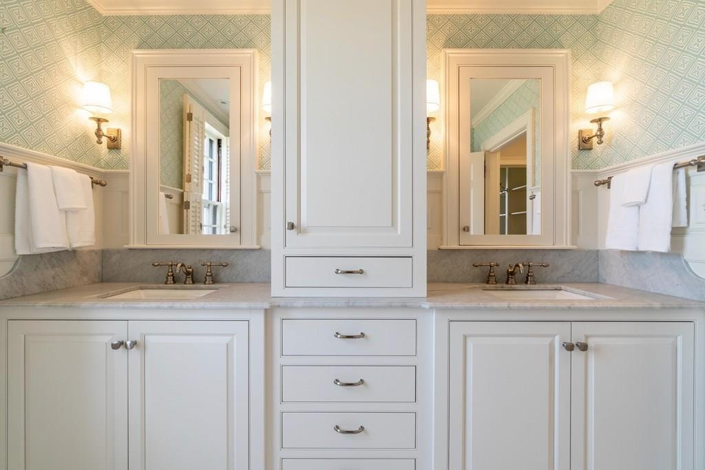43 Burditt Avenue Hingham, MA 02043 - Photo 31 of 41 a bathroom with a granite countertop sink and a mirror