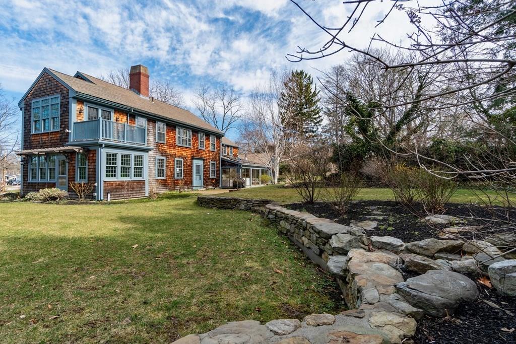 43 Burditt Avenue Hingham, MA 02043 - Photo 6 of 41 a front view of a house with a yard