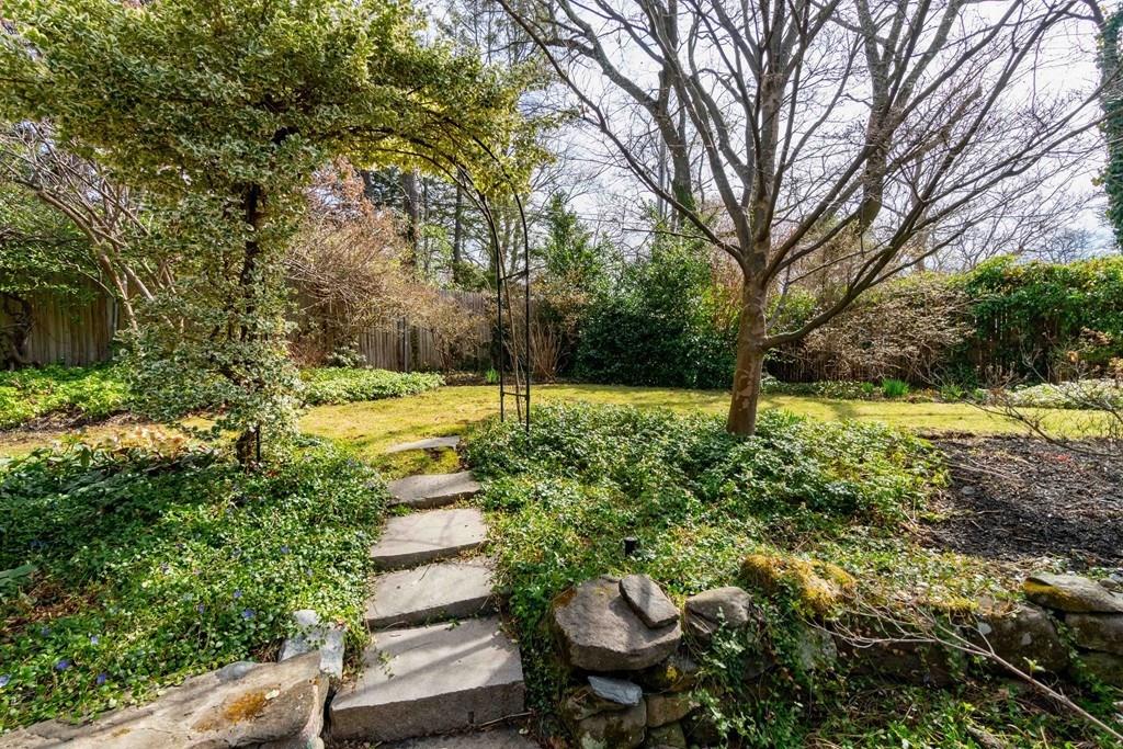 43 Burditt Avenue Hingham, MA 02043 - Photo 7 of 41 a view of a backyard with large trees