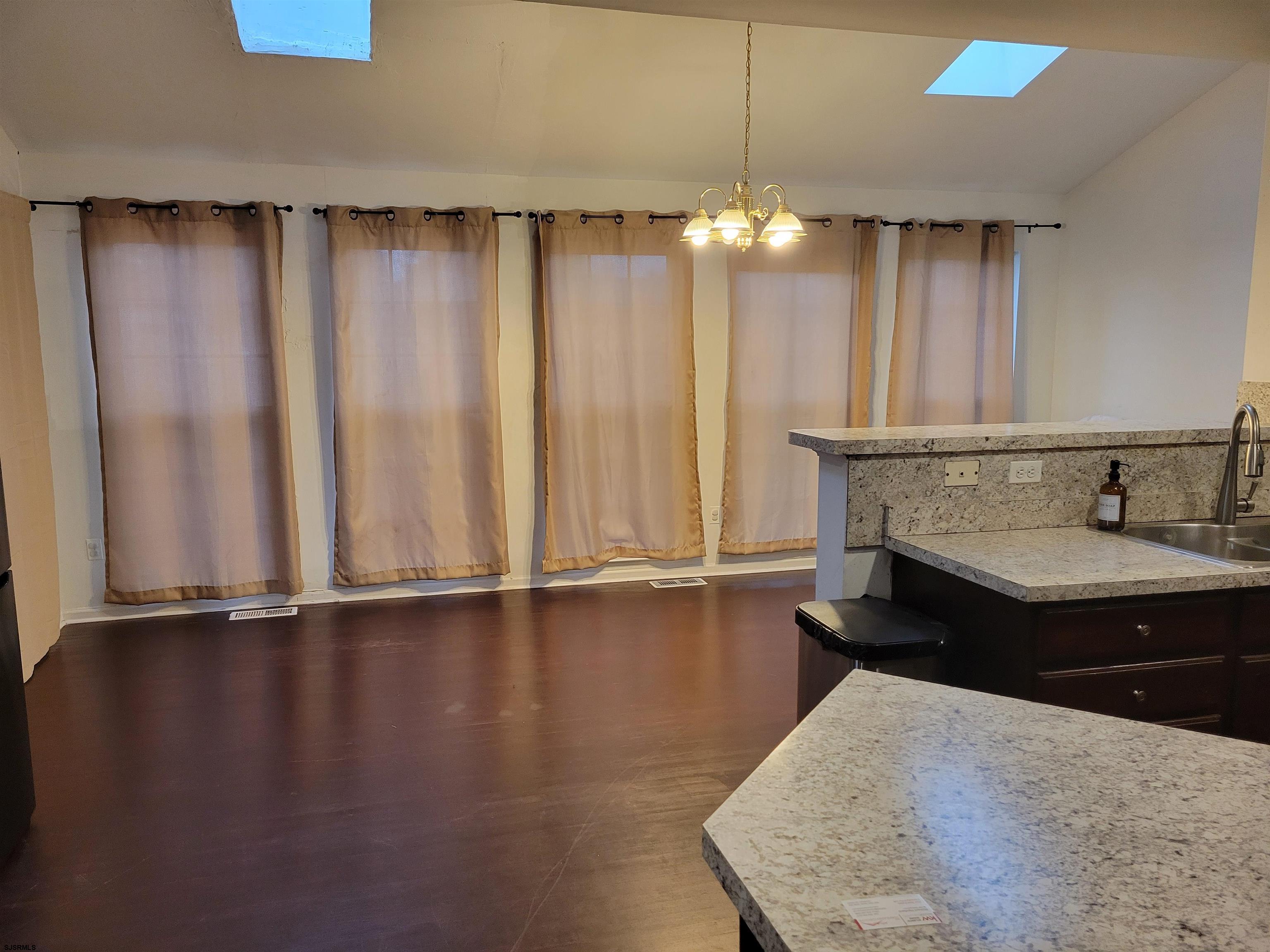 21 Sugarberry Road Egg Harbor Township, NJ 08234 - Photo 13 of 59 a view of kitchen with granite countertop window and sink