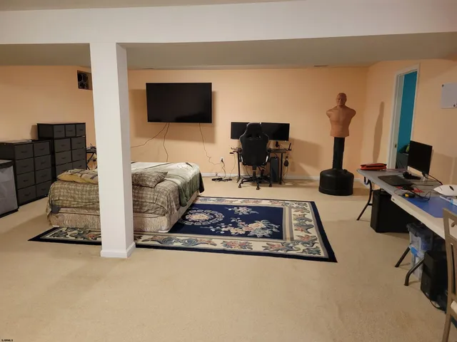 a bathroom with a toilet and a mirror