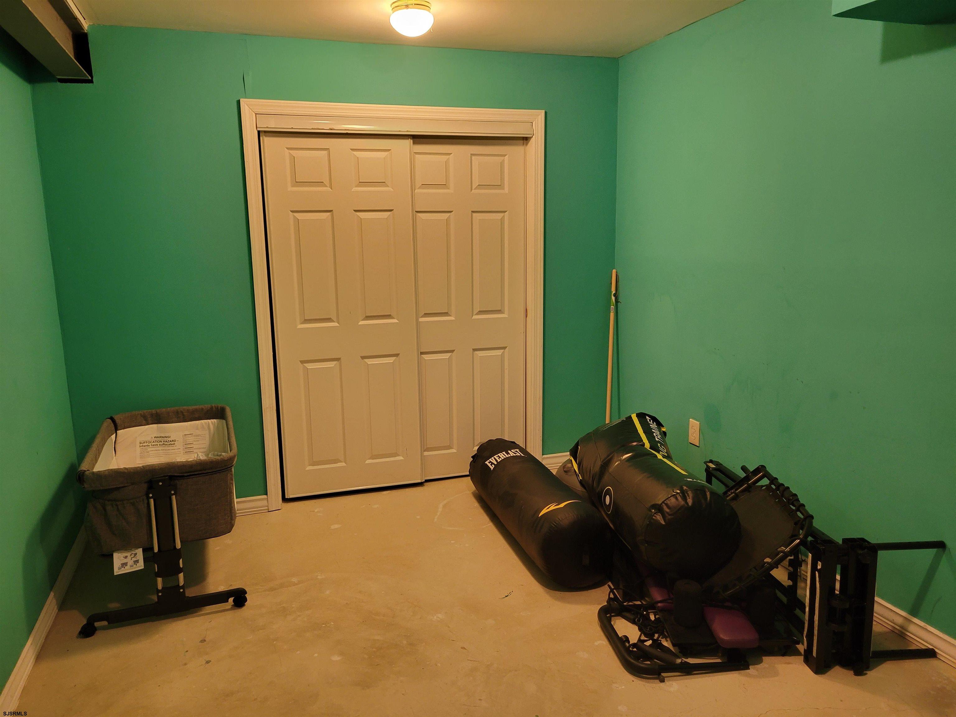 21 Sugarberry Road Egg Harbor Township, NJ 08234 - Photo 42 of 59 a room with a chair and a table