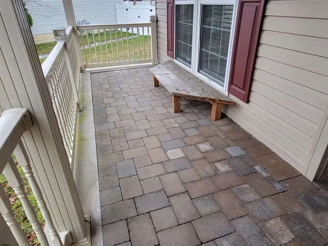 a view of entryway with wooden floor and window