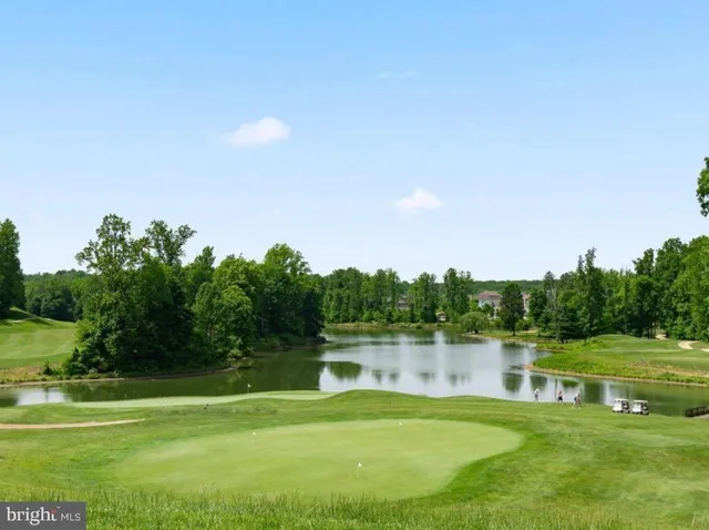 a view of a lake with a big yard