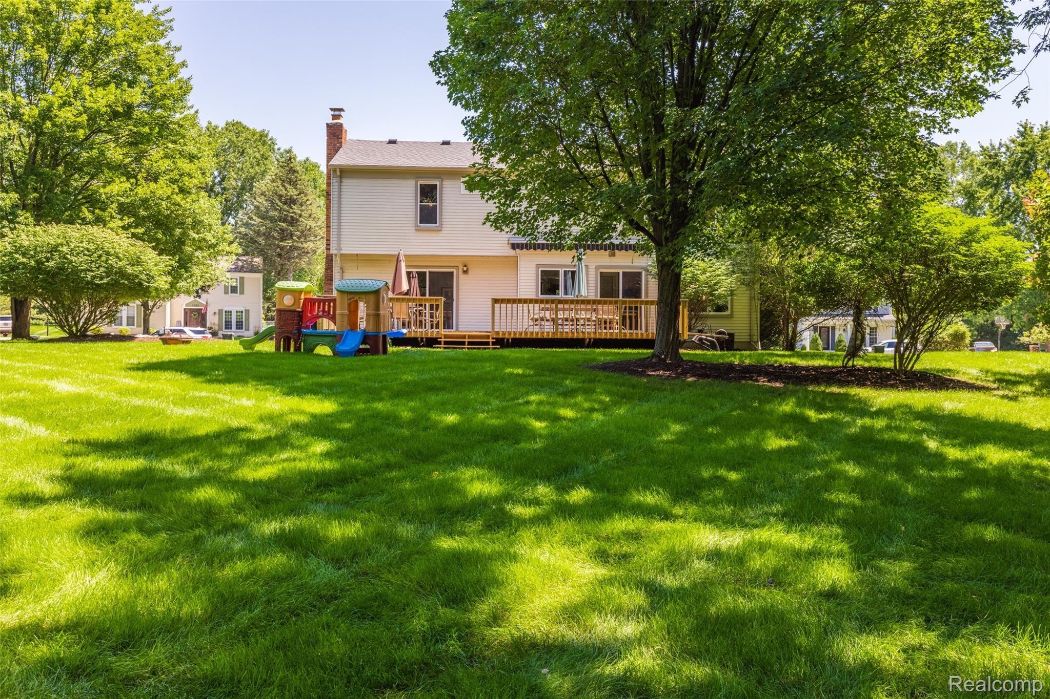 1295 Barneswood Lane Rochester, MI 48306 - Photo 26 of 31 26-View of the back of the home.jpg