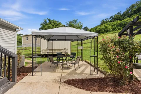 a view of outdoor space yard deck patio and outdoor seating