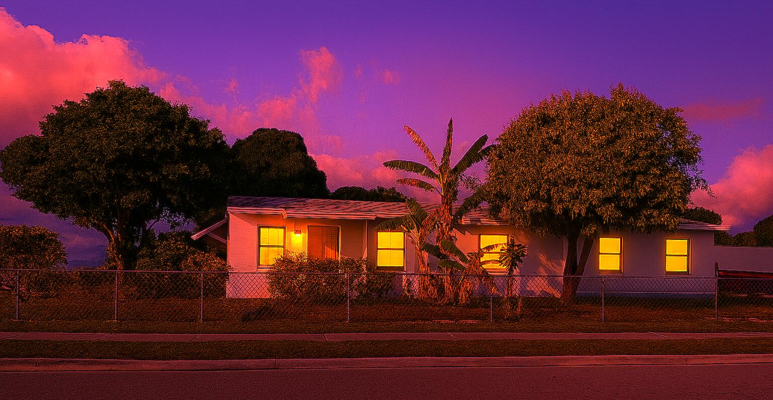 1060 West 26th Court Riviera Beach, FL 33404 - Photo 3 of 23 a view of a building from a yard