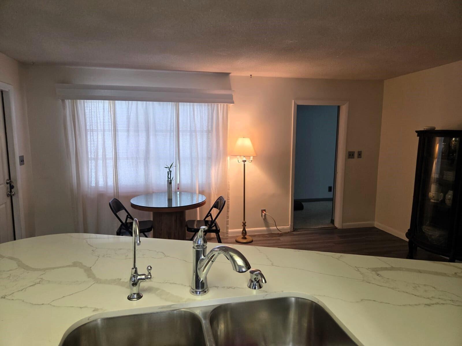 1060 West 26th Court Riviera Beach, FL 33404 - Photo 8 of 23 a dining room with table and chairs