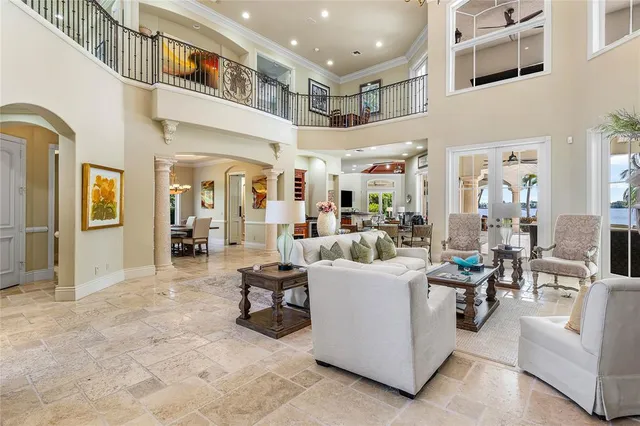 a bathroom with a granite countertop sink a toilet and a mirror