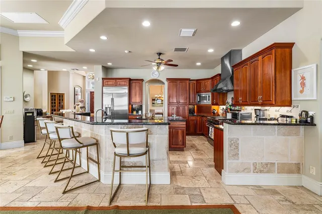 a living room with furniture tv and a large window