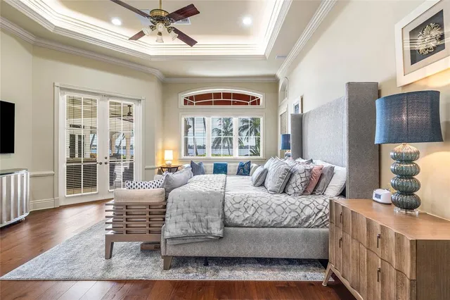 a view of a dining room with furniture and a potted plant