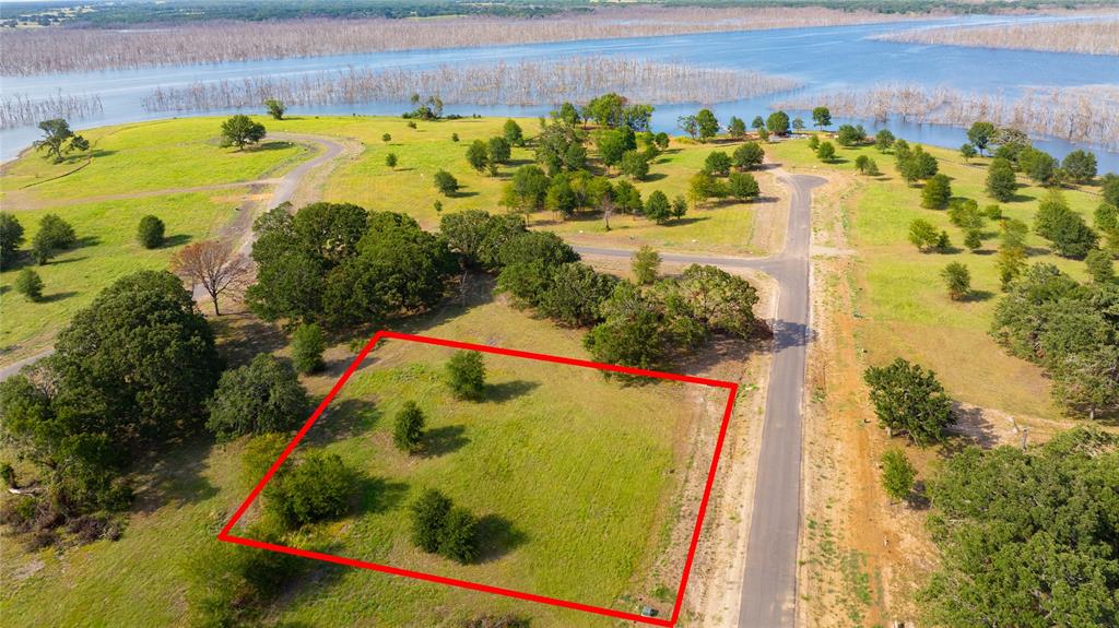 Lot 95 Water Edge Way Bonham, TX 75418 - Photo 1 of 21 a view of a swimming pool with a yard