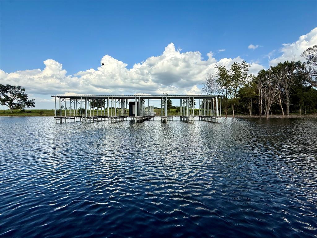Lot 95 Water Edge Way Bonham, TX 75418 - Photo 5 of 21 a view of swimming pool with yard and lake view in back