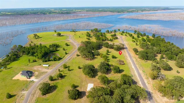 a view of a lake with a beach