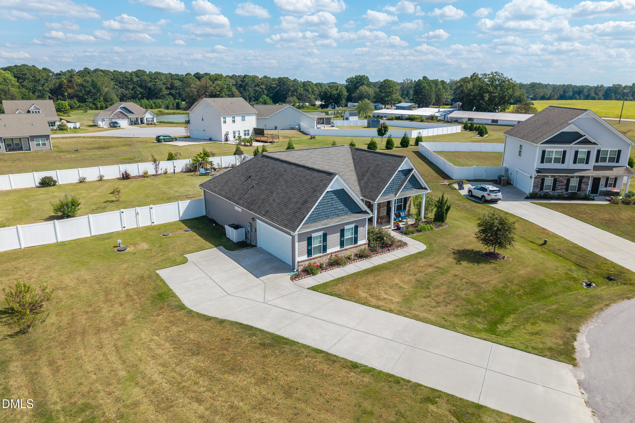 91 Charlottes Web Circle Benson, NC 27504 - Photo 26 of 29 a view of a house with a ocean view