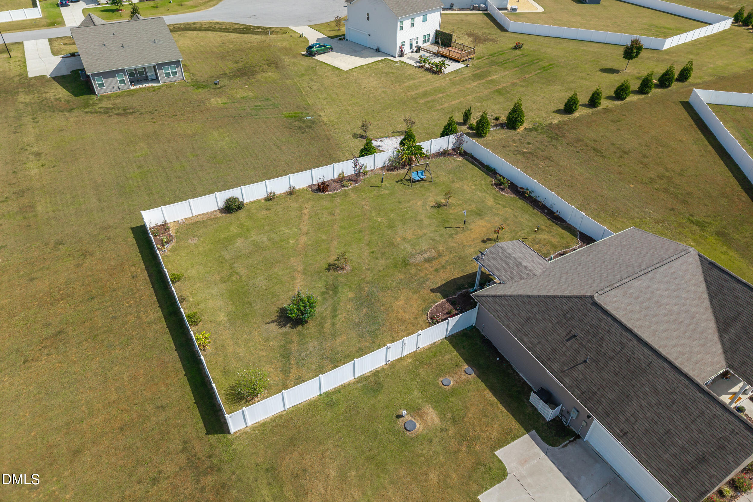 91 Charlottes Web Circle Benson, NC 27504 - Photo 27 of 29 an aerial view of residential house with pool