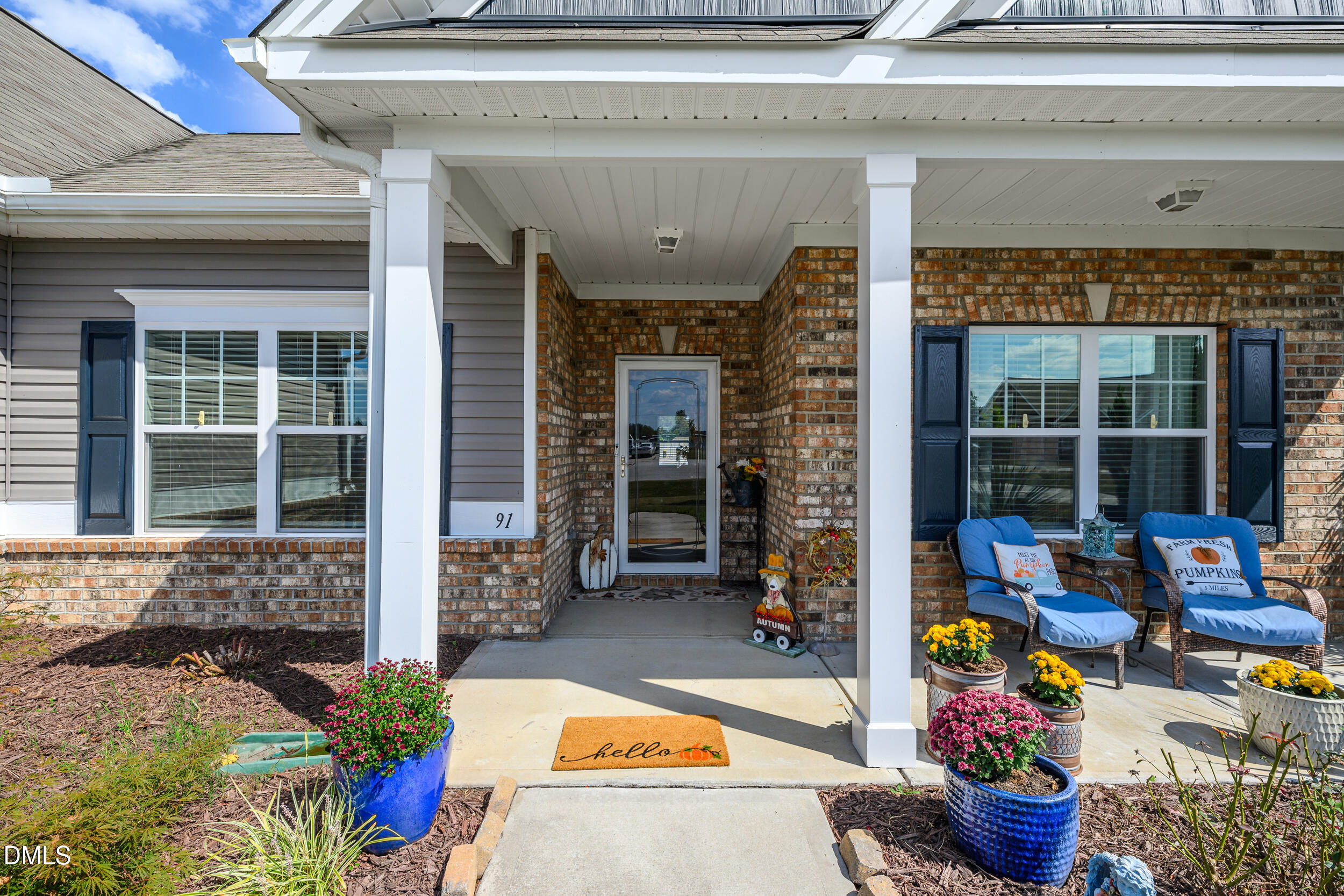 91 Charlottes Web Circle Benson, NC 27504 - Photo 4 of 29 a view of a entryway front of house