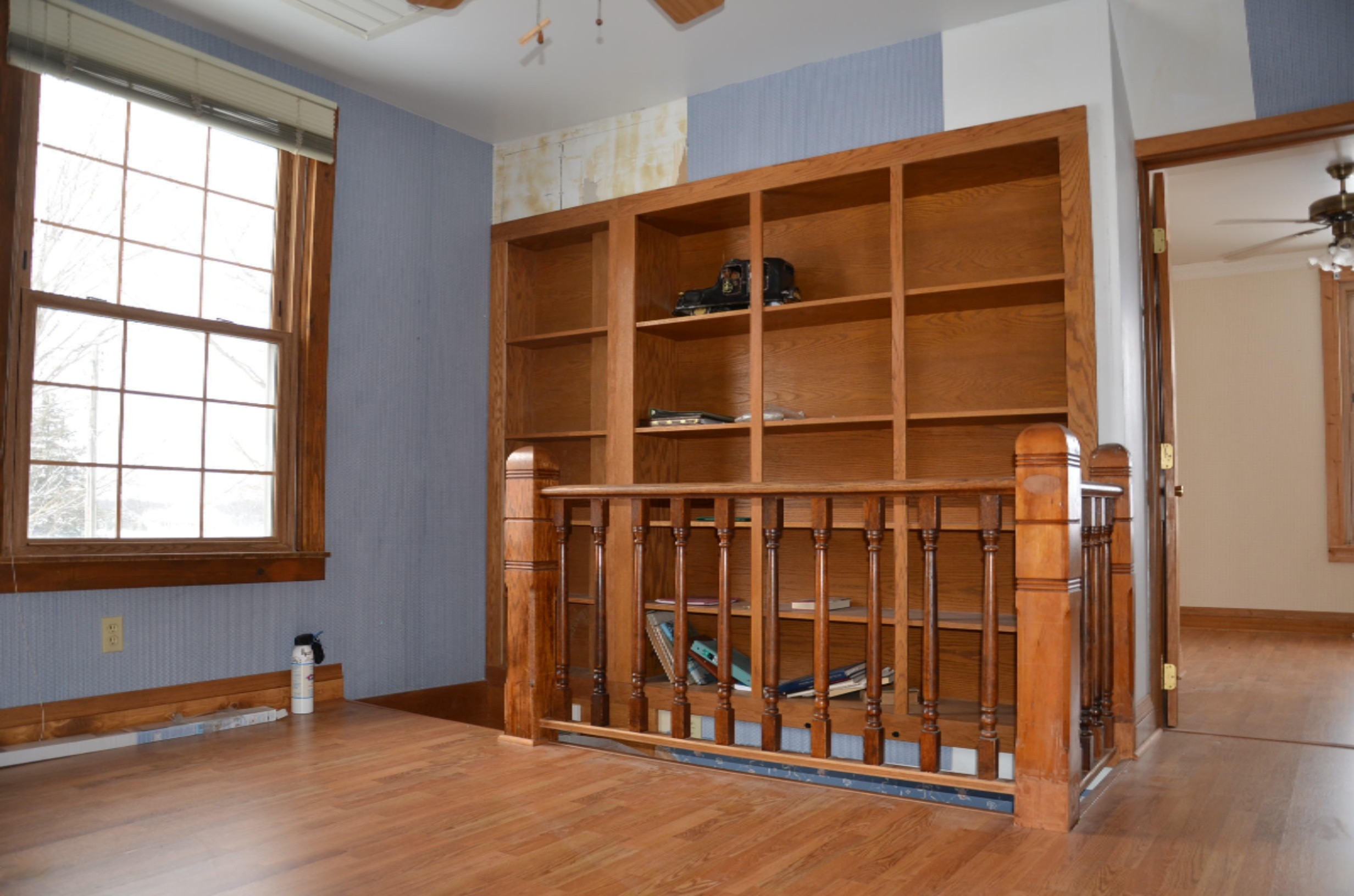 8625 Milo Road Delton, MI 49046 - Photo 17 of 31 level 2 book shelf/stair well