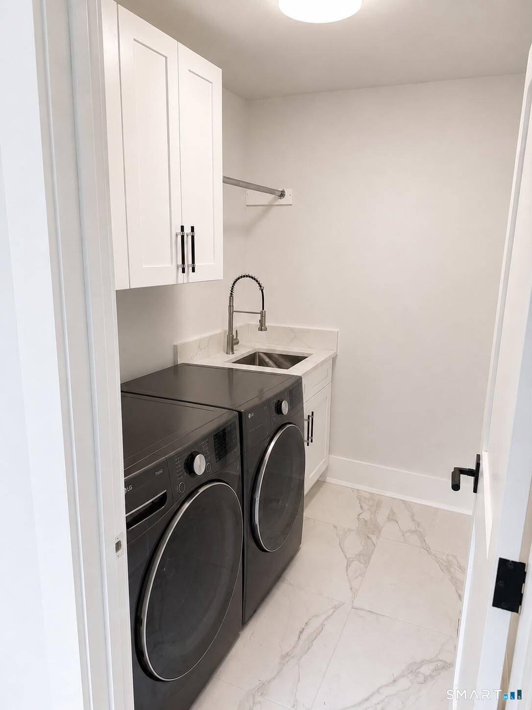 29 Flint Rock Road Stamford, CT 06903 - Photo 13 of 34 1st Floor Laundry Room with brand new LG Washer & Dryer.