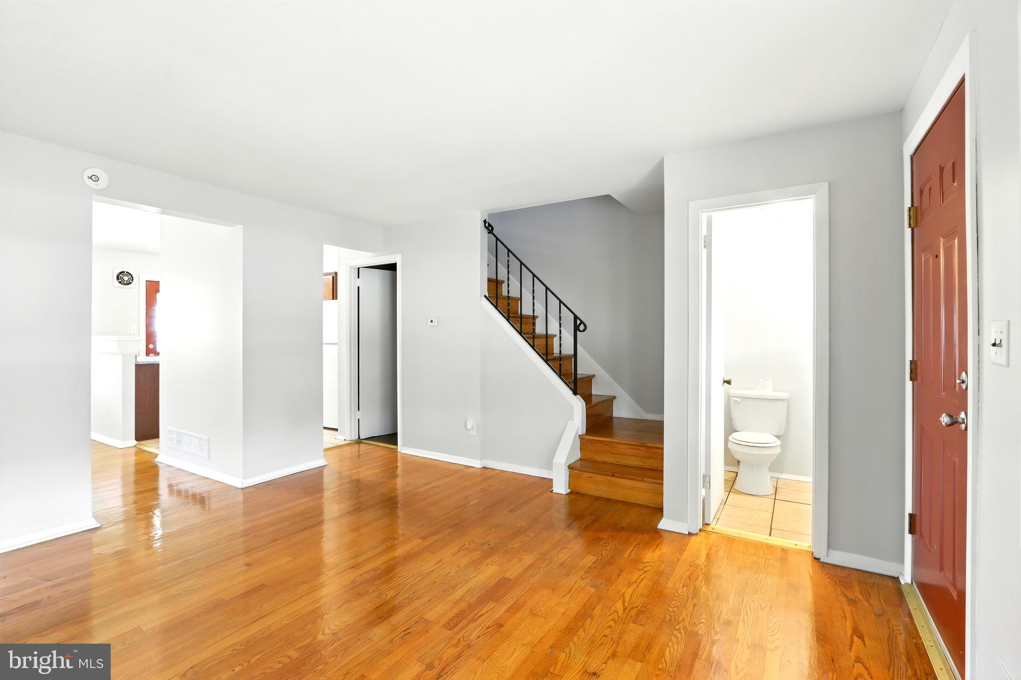 4255 Labyrinth Road Baltimore, MD 21215 - Photo 13 of 27 a view of entryway and hall with wooden floor