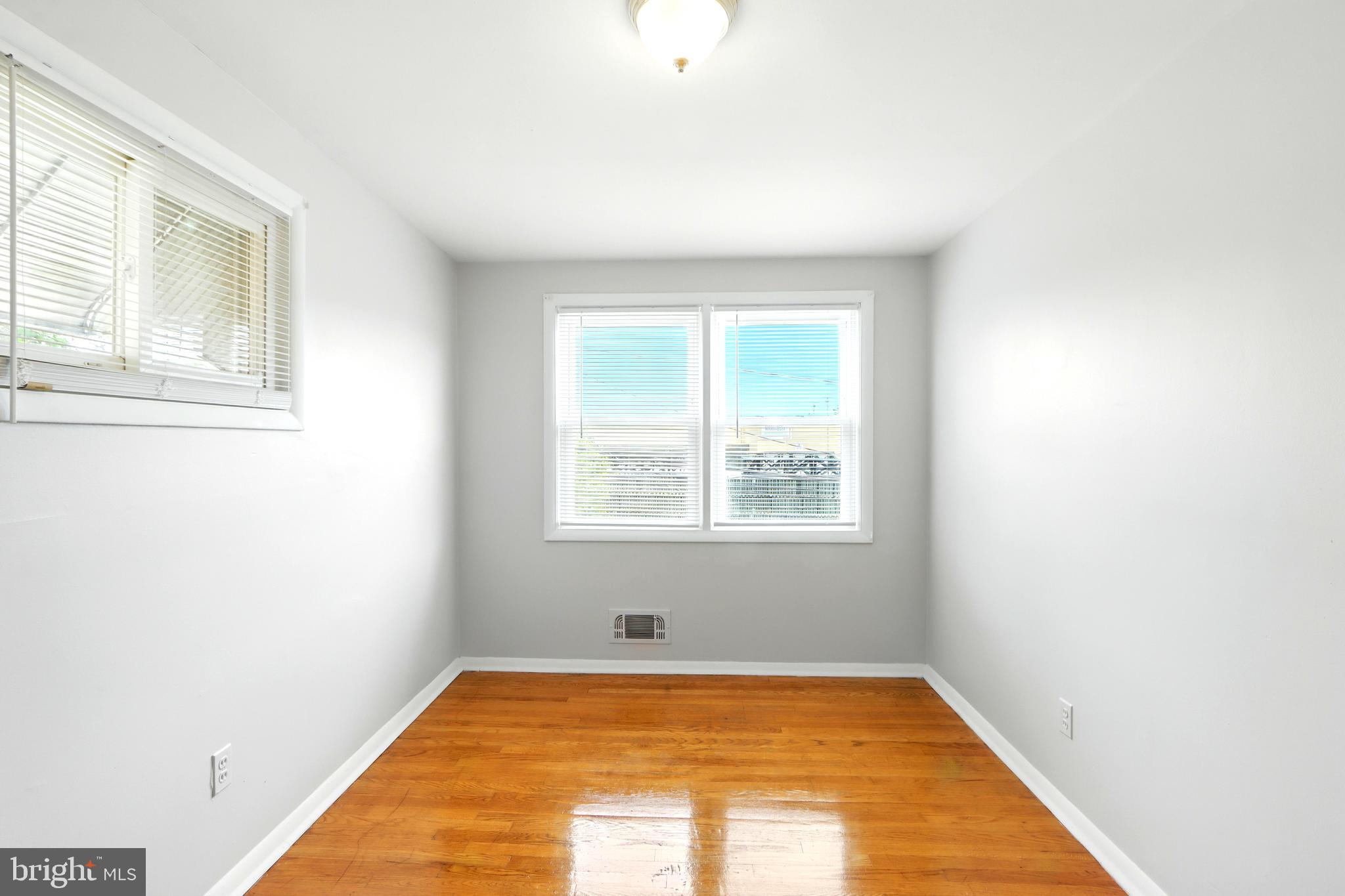 4255 Labyrinth Road Baltimore, MD 21215 - Photo 19 of 27 a view of a room with windows
